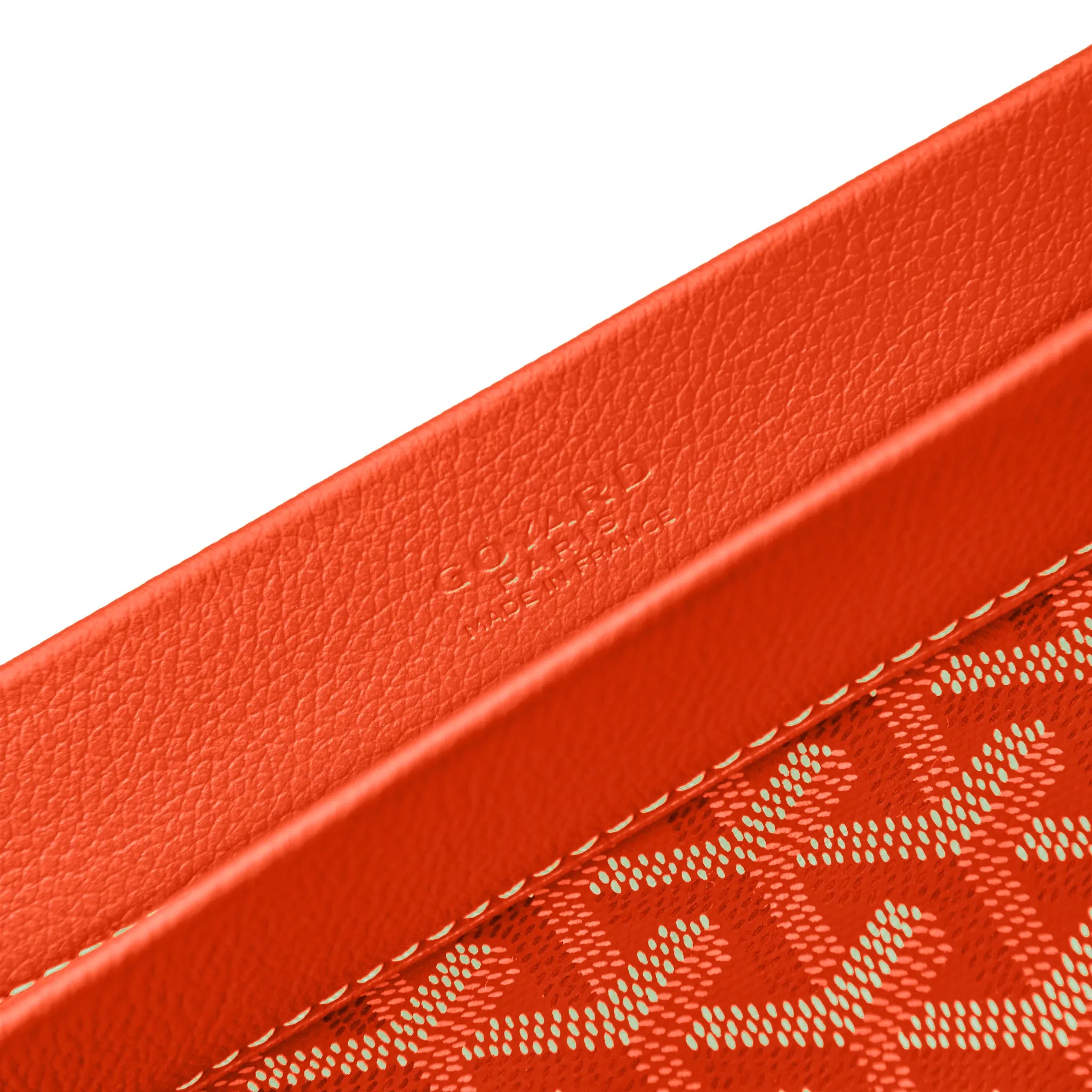 Logo detail view of Goyard Conti Orange Pouch